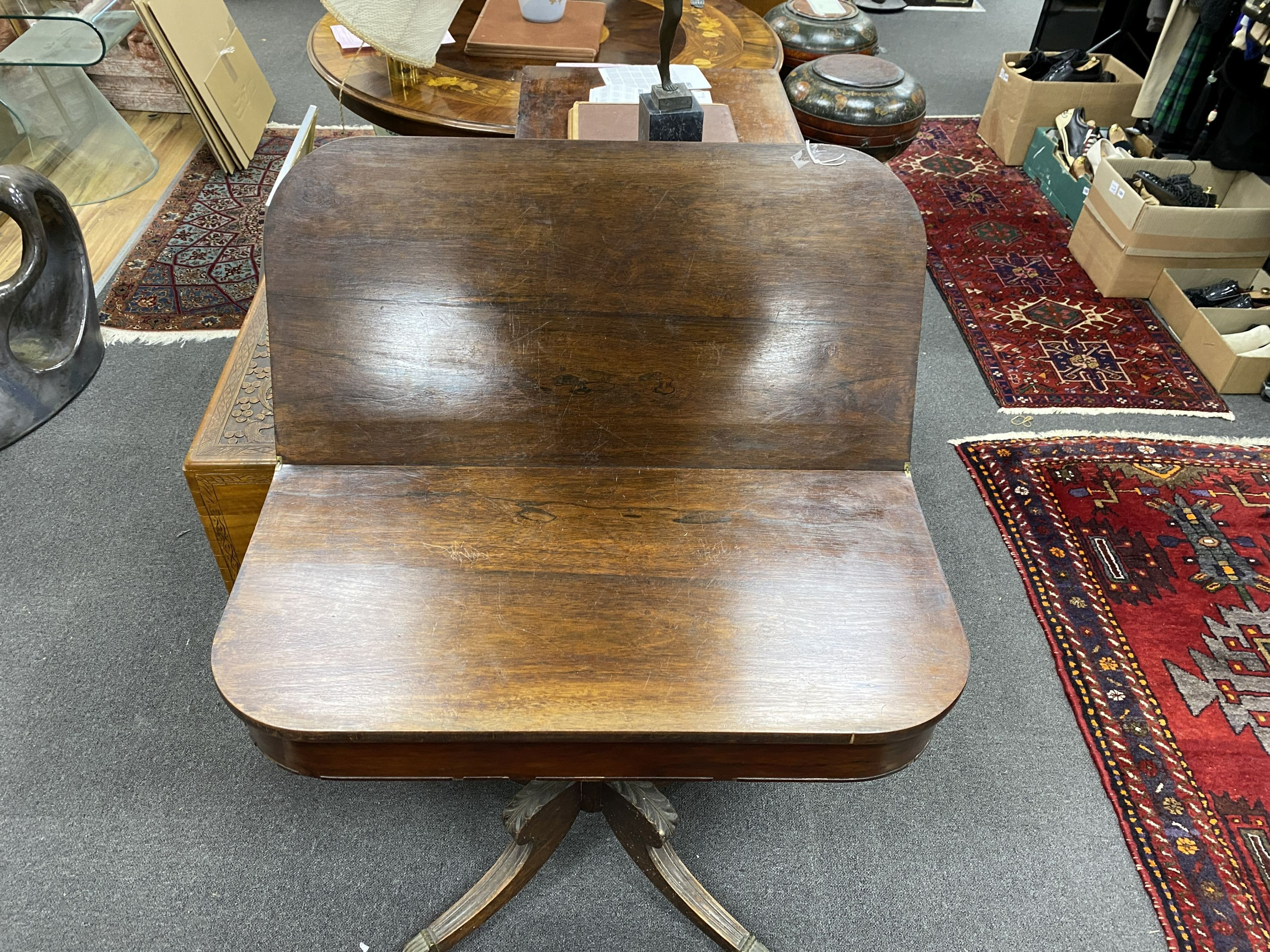 A Regency rosewood D shaped folding tea table, width 91cm, depth 45cm, height 72cm